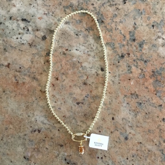 Kendra Scott Gold Metal Strand Football Pendant Necklace - Picture 2 of 8